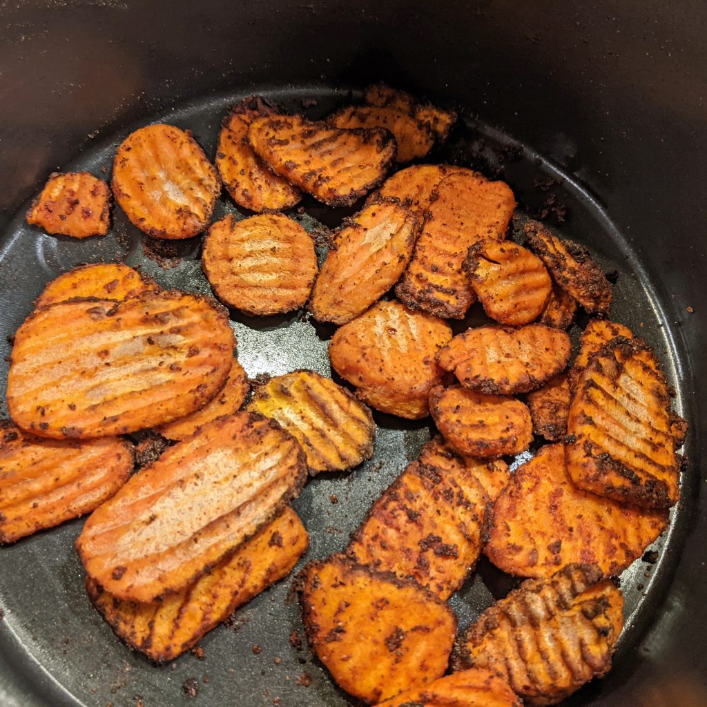 close up picture of cooked carrot chips covered in fiesta ranch seasoning