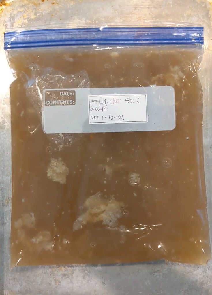 Bag of frozen homemade rotisserie chicken stock